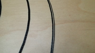 About the same around the 3 area. Raised and not even within 1mm of the bed.