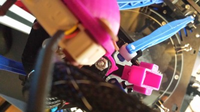 Pushed into position without screw in place