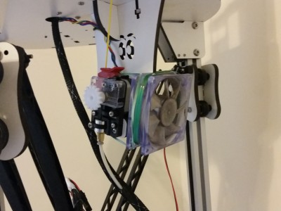 Old scavenged cooling fan pointed at extruder motor
