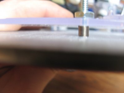 IMG_6213.JPG (48.3 KiB) Viewed 19257 times Here is the spring setup, I will release them a bit. But the whole shebang is only .475 thick with them released a bit.<br />I used 6/32x1 countersunk screws and the heads are epoxied into the AL plate.<br />The height is not an issue as I gained travel by changing out the bent all threads, still more than stock H1