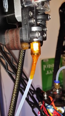 Glued and kapton taped.