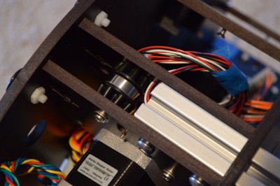 The wires successfully pulled through the alluminum and routed out the bottom of the mount.