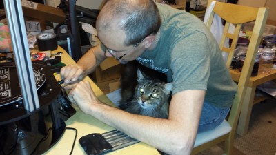 Every good maker has a helper... Mine just happens love sitting all 18 LBS of her Maine Coon fur butt in my lap while I work. Could be worse I guess.. Just adding the finishing touches to the RAMBO LCD.. The STOP button was sticking a bit.. Nothing a bit of jewelry filing will not fix in a jiffy.