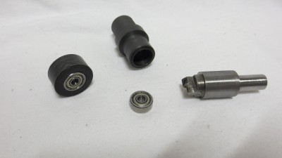 I made a custom endmill/drill/reamer to bore the bearing holes to a diameter between 12.9 and 13mm for a nice press fit.